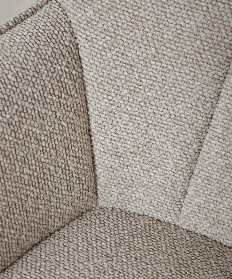 Sillón tapizado en tela bouclé con Ottoman Elska