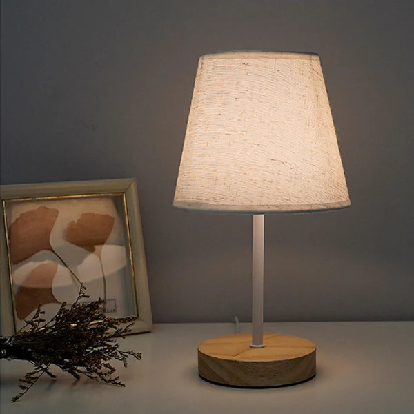 Modern Minimalist Trapezoidal Rubberwood Fabric LED Table Lamp For Bedroom