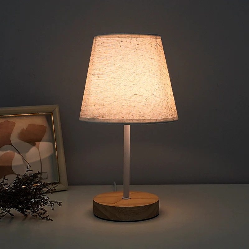 Modern Minimalist Trapezoidal Rubberwood Fabric LED Table Lamp For Bedroom