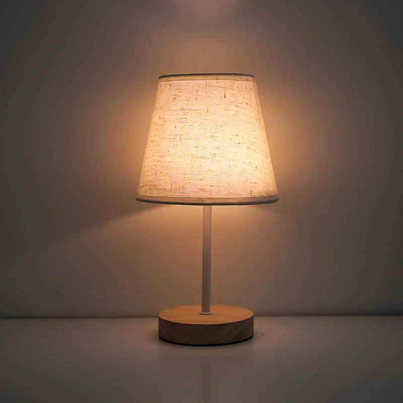 Modern Minimalist Trapezoidal Rubberwood Fabric LED Table Lamp For Bedroom