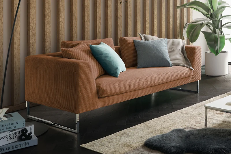 KAWOLA Sofa ARIAN 2,5-Sitzer Metallkufe chrom Cord rost